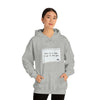 Picture of the Fitness Geeker graphic saying "This is a sign, to go to the Gym" Heavy Blend Hooded Sweatshirt (front) in grey model